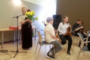 В концертном центре «Женева» открыли памятную табличку к 80-летию первого русского певческого праздника